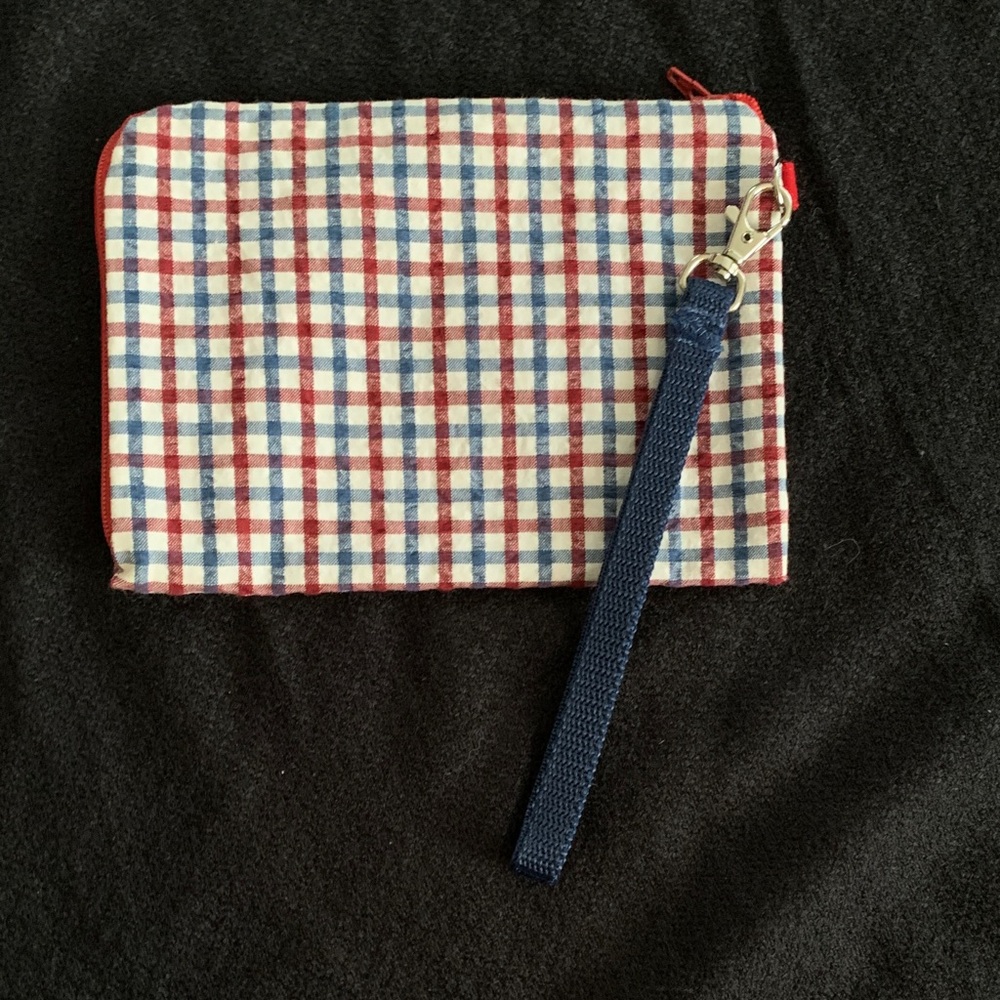 Hand made wristlet with zipper closure; blue & red & white gingham pattern